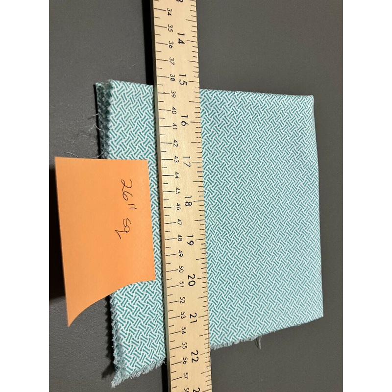 Turquoise on white fabric