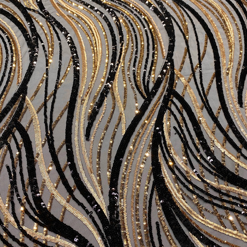Skyfall Sequins Wholesale Fabric in Black and Gold