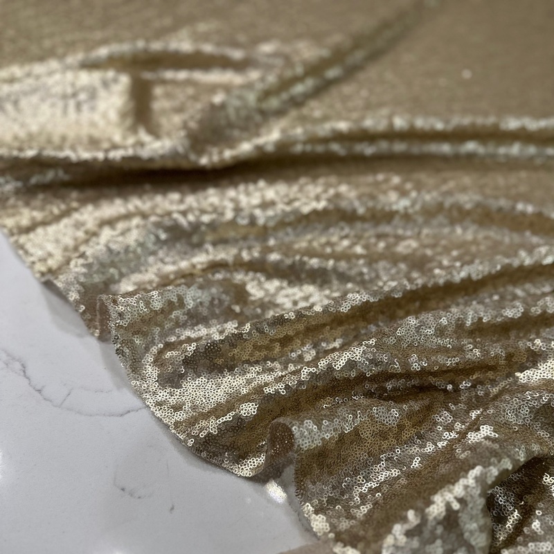 Glitz Sequins Wholesale Fabric in Champagne