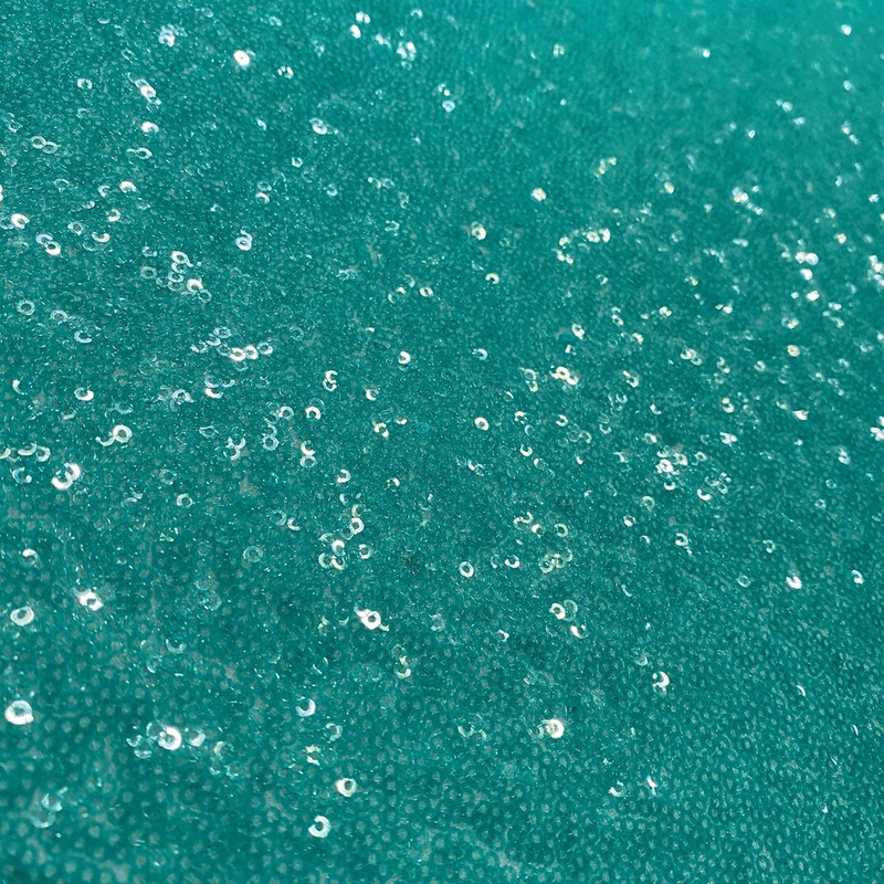 Glitz Sequins Wholesale Fabric in Teal Green