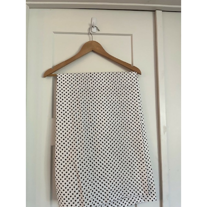 Brown polka dots on white